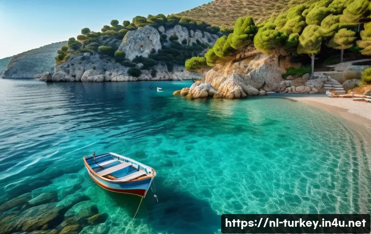 튀르키예 주요 힐링 여행지 - A serene hidden cove along the Turkish Aegean coast at sunset, featuring crystal-clear turquoise wat...